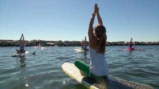 Yoga im Hafen von Rye, New Hampshire
