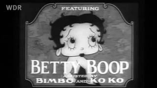Schwarz weiß Bild der Zeichentrickfigur Betty Boop mit kurzen schwarzen Haaren und großen Kulleraugen.